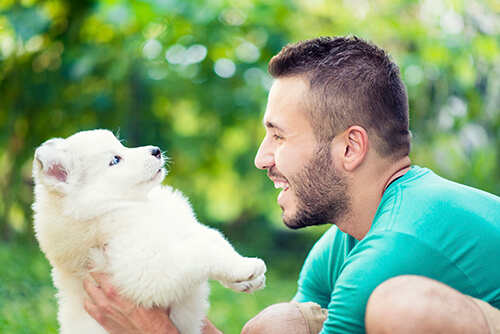 Young guy and new puppy