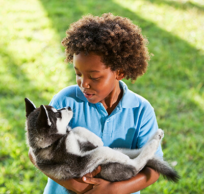 Young boy and his dog friend